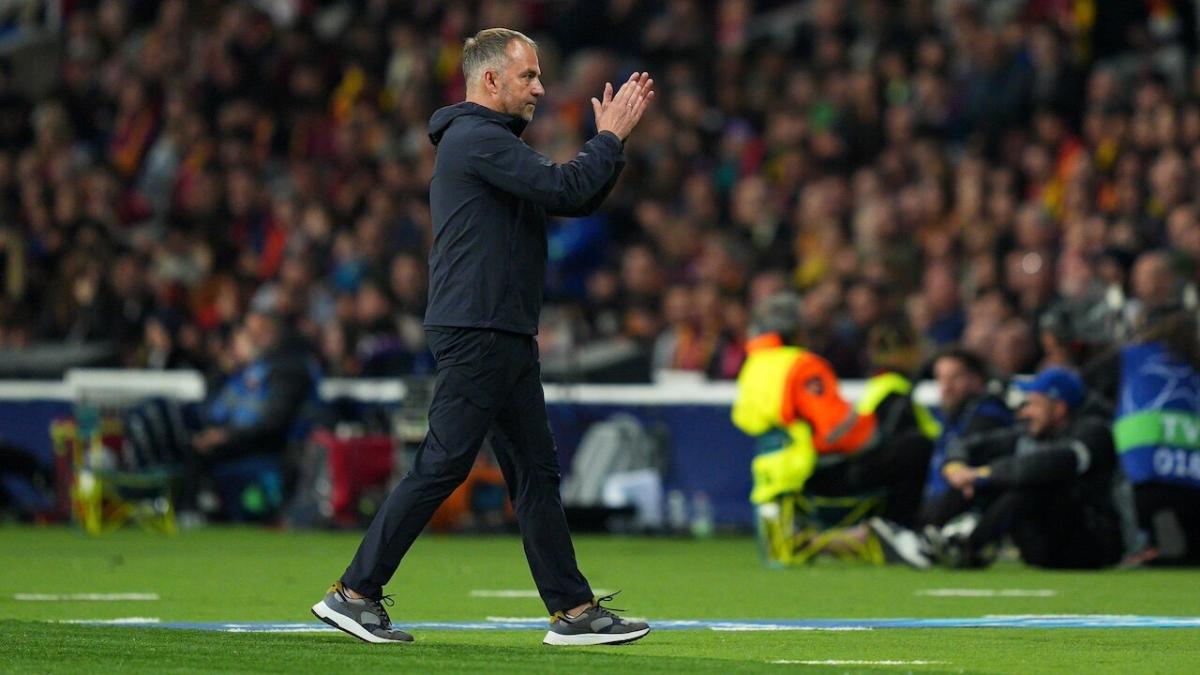 Barcelona coach Hansi Flick applauding